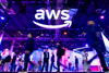 Attendees walk the expo floor at AWS re:Invent 2023.